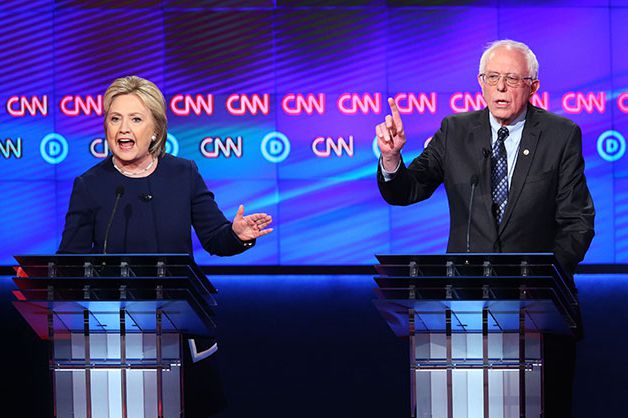 Hillary Clinton and Bernie Sanders, debating